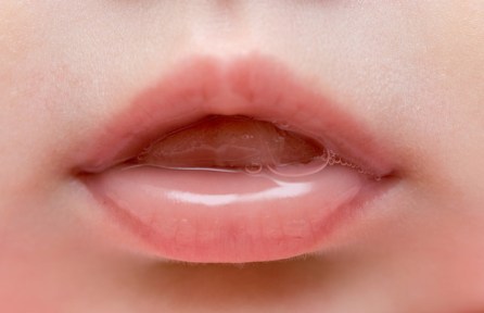 close up of lips of baby girl